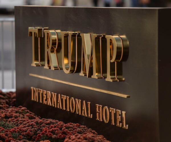 the sign outdoors of the trump international hotel in washington, d.c.