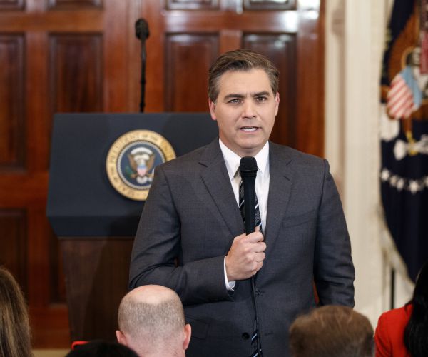 cnn ournalist jm acosta does a standup before a new conference with president donald trump. 