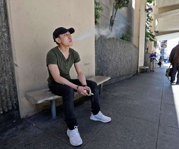 A man smoking an e-cigarette in San Francisco