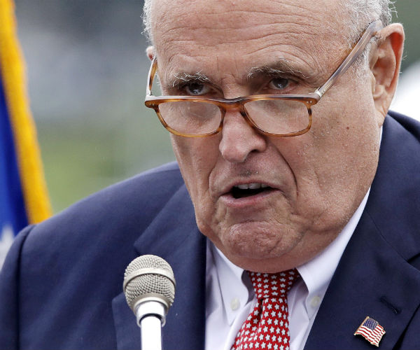 Rudy Giuliani, an attorney for President Donald Trump, addresses a gathering during a campaign event.