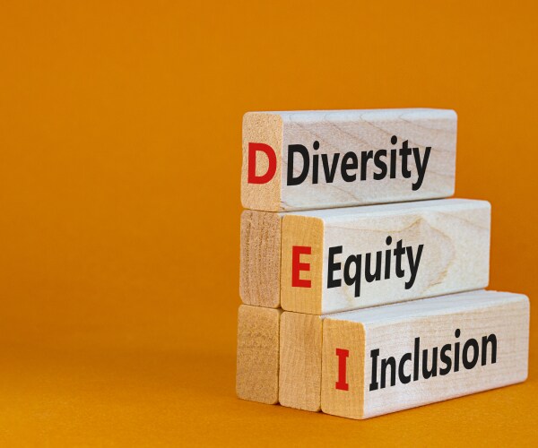 wooden blocks stacked to read diversity equity inclusion