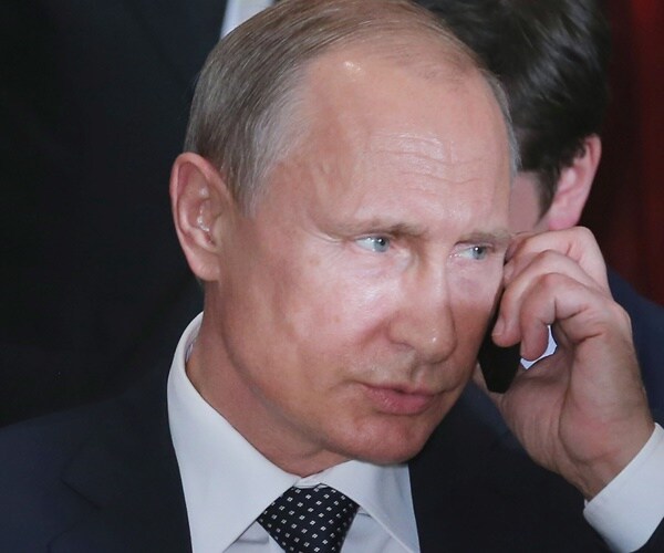 vladimir putin speakson the phone