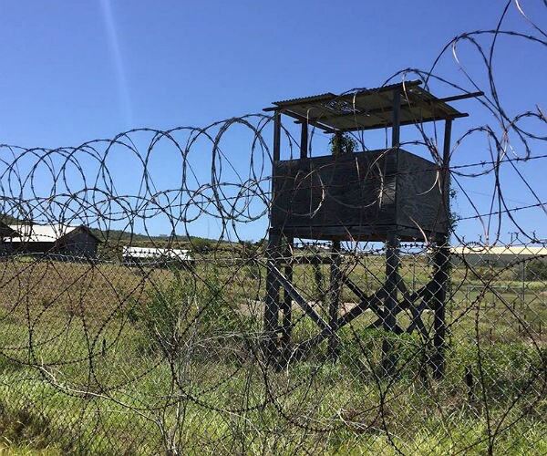 Report: Feds Outsourcing Gitmo Trials 