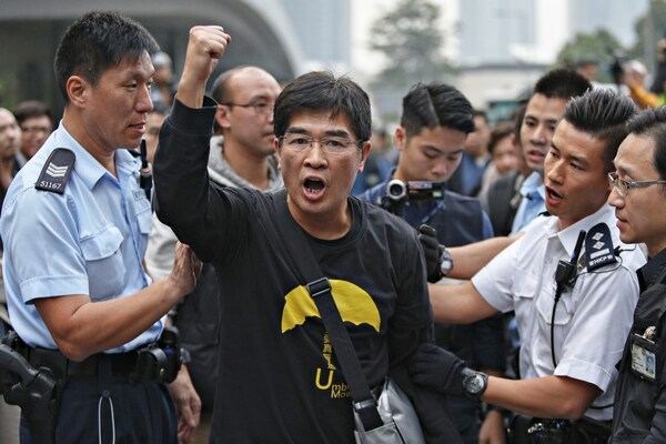 Hong Kong Protesters Arrested as Officials Clear Away Main Camp