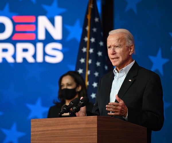 joe biden and kamala harris on a stage