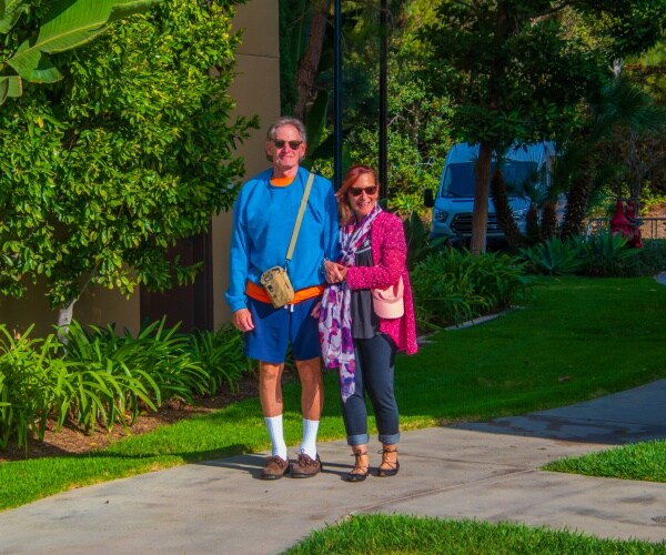 couple walking in park, man with Alzheimer's