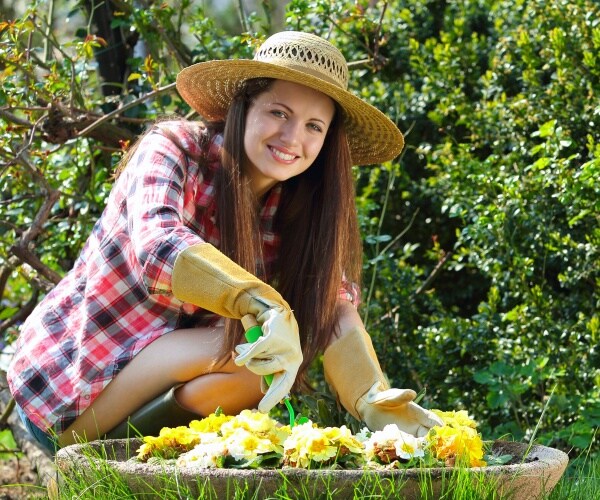 smiling woman gardening