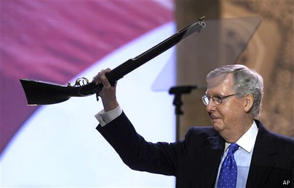 McConnell Brandishes Rifle at CPAC in Tribute to Retiring Sen. Coburn 