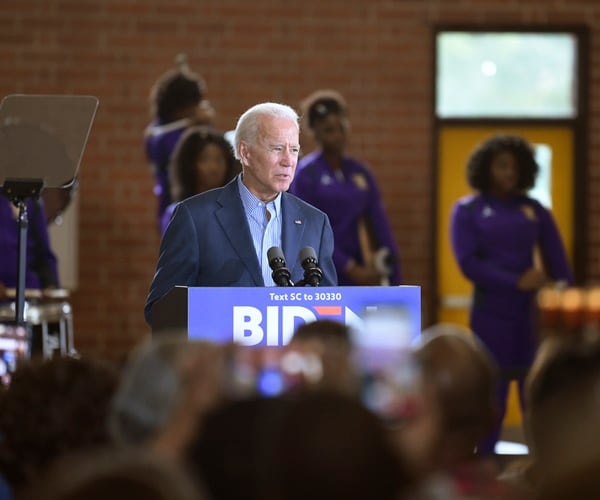 joe biden speaks to supporters at a town hall