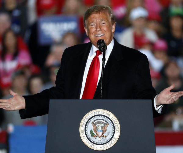 president donald trump speaks during a rally in illinois.