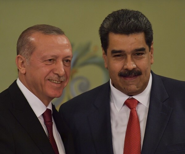 president recep tayyip erdogan and venezuelan president nicolas maduro smiling