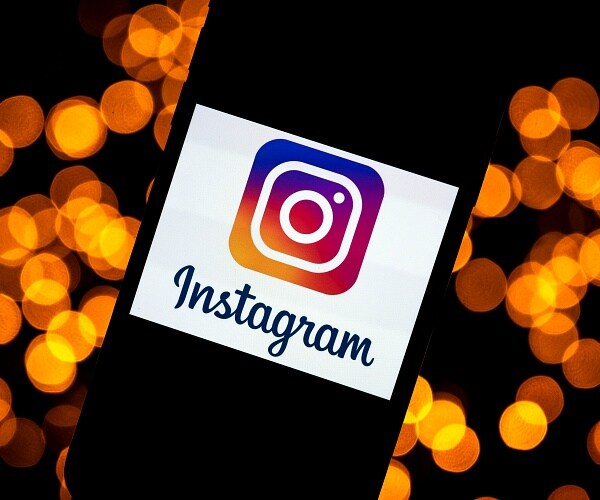 instagram logo on phone