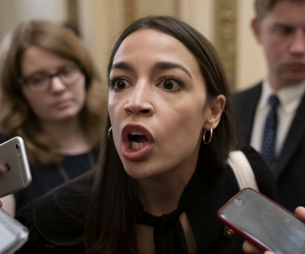 aoc talking to reporters as they record her with iphones 