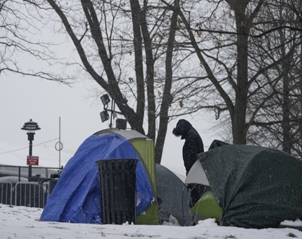 With Beds Scarce and Winter Bearing Down, a Tent Camp Grows outside NYC's Largest Migrant Shelter