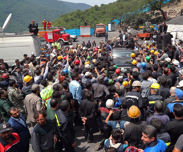 Hassan Rouhani's Car Mobbed in Iran by Angry Miners