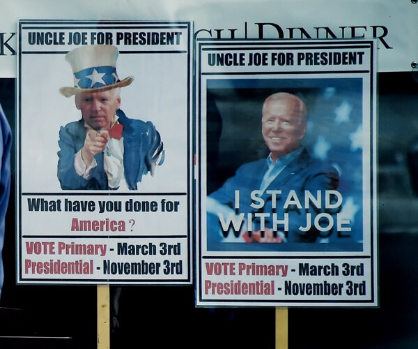 signs for joe biden's presidential campaign in alexandria virginia