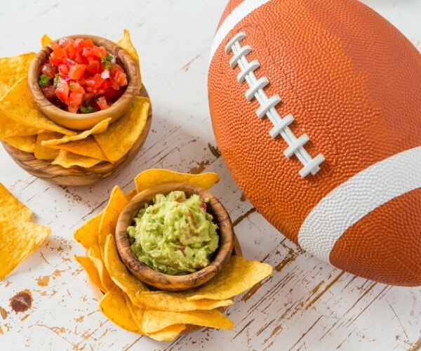 Football, chips and salsa and guacamole