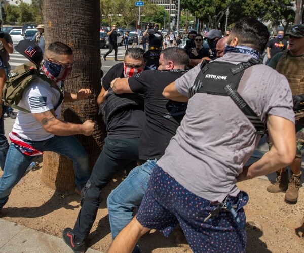 Man Stabbed, Reporter Attacked at Anti-Vax Mandate Protest in LA