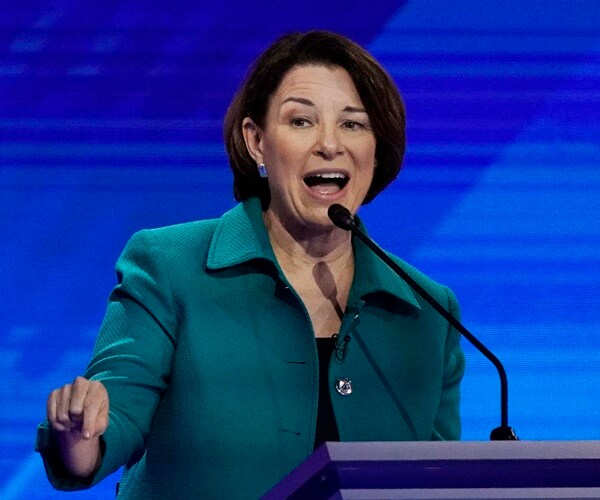 amy klobucha speaks at the democratic debate