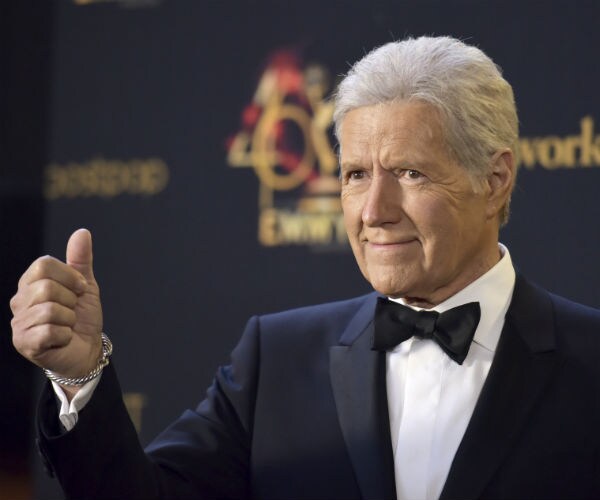 alex trebek is shown in a tux