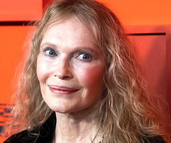 mia farrow cracks a smile on the red carpet