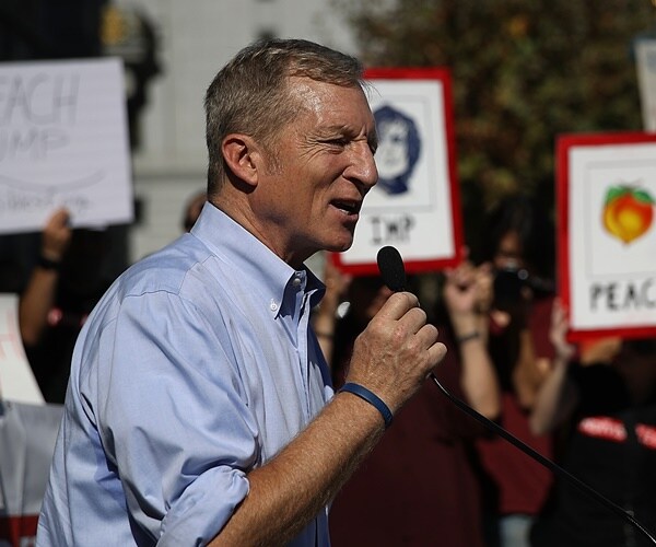 tom steyer speaks at a rally