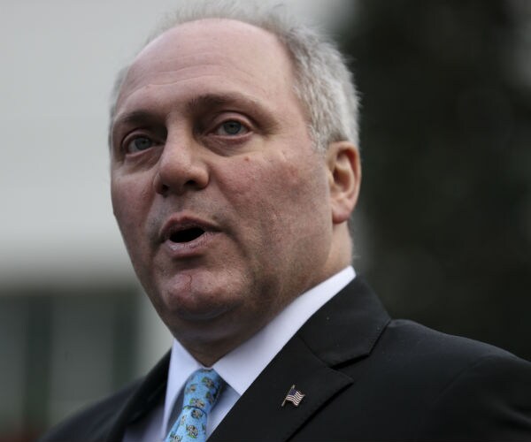 louisiana republican representative steve scalise looks to his left and speaks to reporters