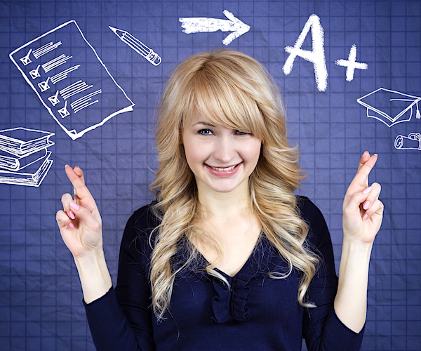 Portrait beautiful woman, student crossing her fingers, hoping for best, good grades in school, college, after studying