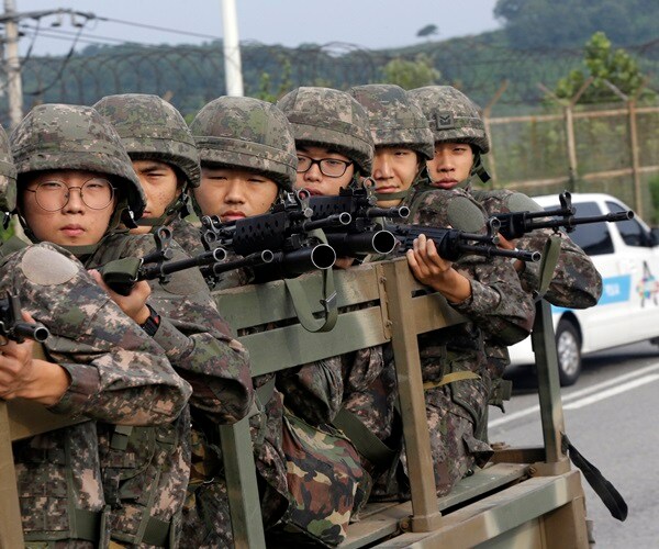 Koreas Agree to End Standoff