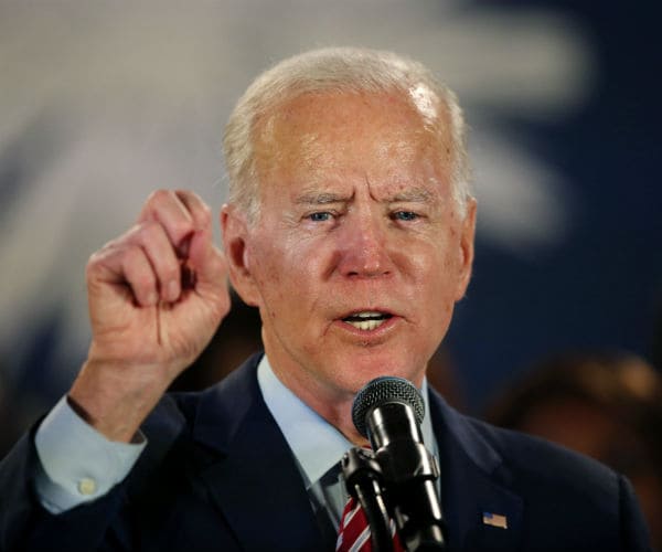 joe biden gestures as he speaks to supporters in south carolina.