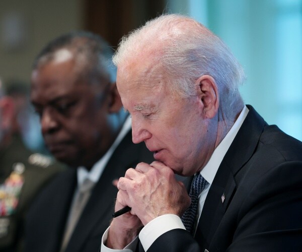 joe biden folds his hands