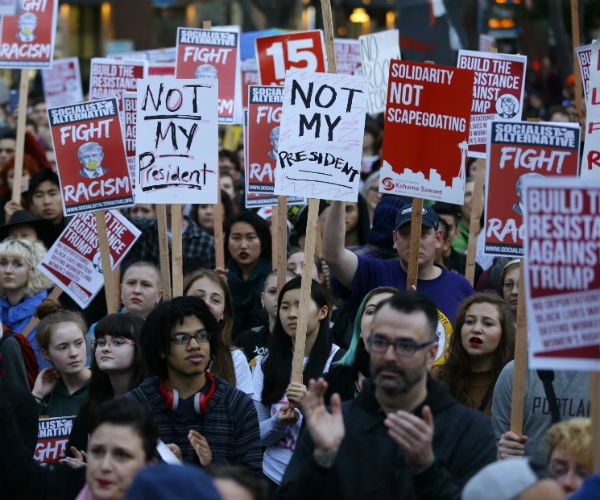 Anti-Trump Protesters Take Over Streets in Major Cities