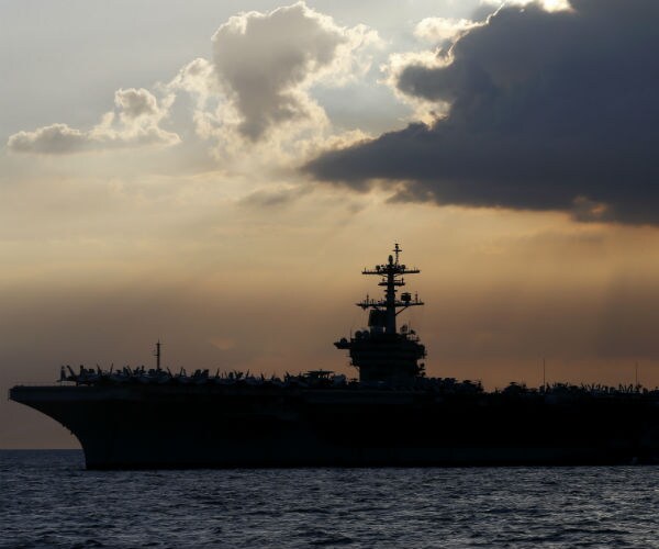 uss theodore roosevelt is shown at sail in a 2018 file photo