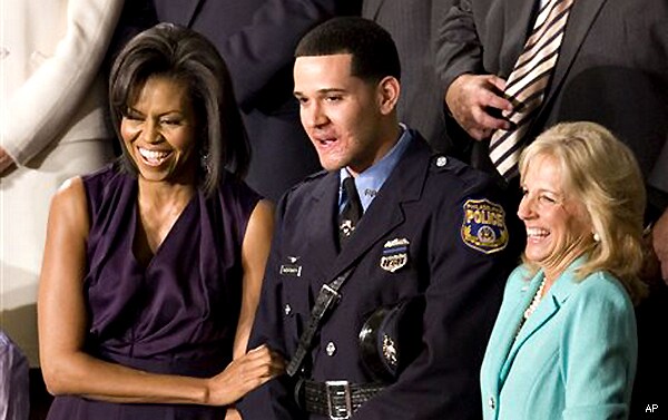 Hero Cop Rape Charge: Officer Pictured With Michele Obama Arrested