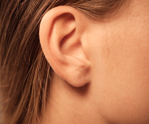 a close-up of a woman's ear