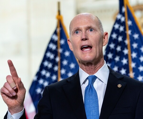 rick scott speaks to press