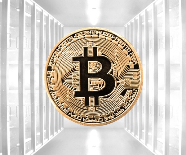 bitcoin is shown with a white hallway background