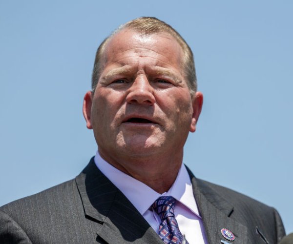 rep. troy nehls speaks during a press conference