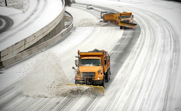 Winter Storm Snarls Travel as Thousands Left Without Power