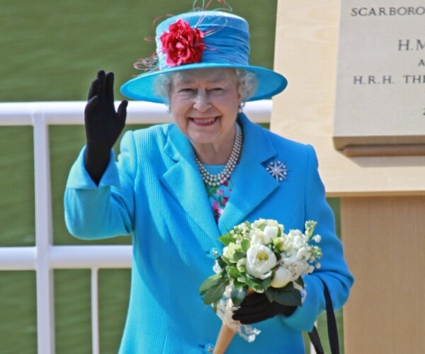 Queen Elizabeth II smiling, waving to camera