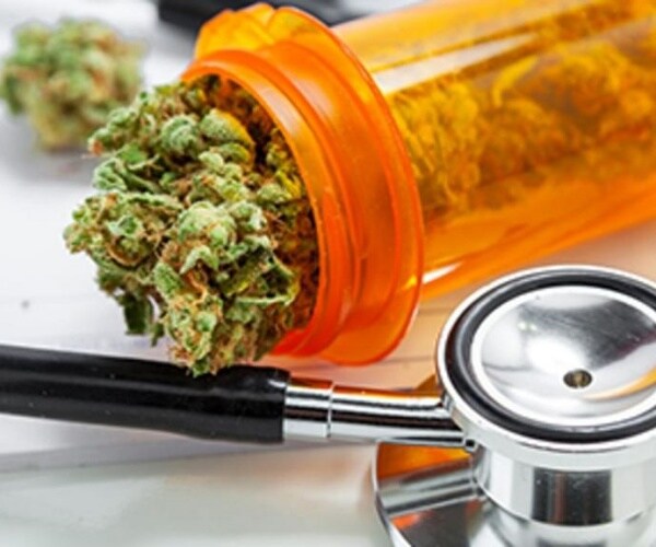 marijuana in prescription vial, stethoscope,