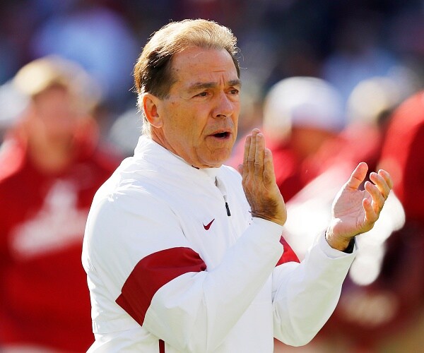 nick saban claps on sideline