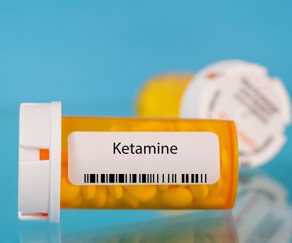 prescription vial labeled 'ketamine'