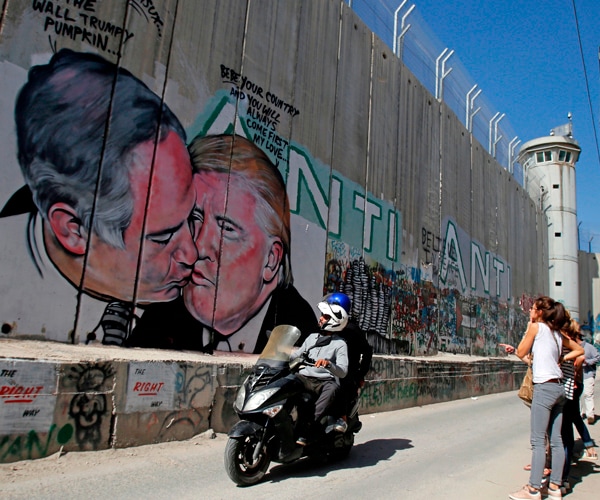 Trump, Netanyahu West Bank Wall Mural Shows Them Kissing