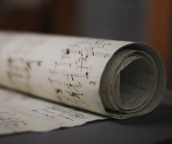 a rolled up piece of the morpeth roll, the world's longest thank-you note