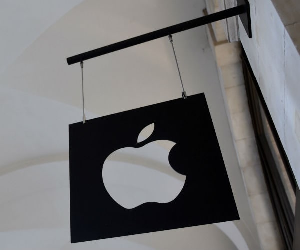 a sign with the apple logo