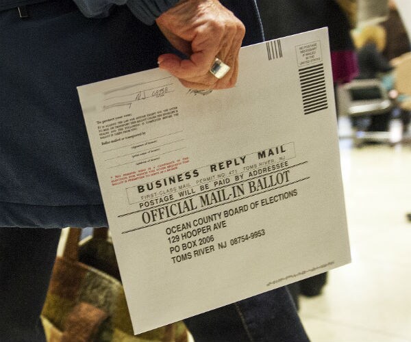 someone carries a mail-in ballot