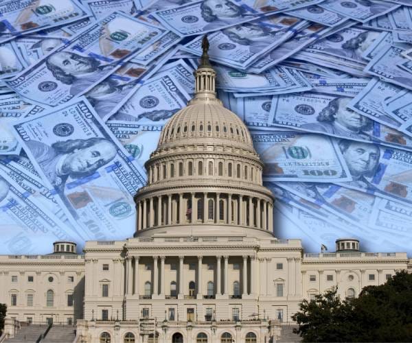 hundred dollar bills in the sky over the united states capitol building