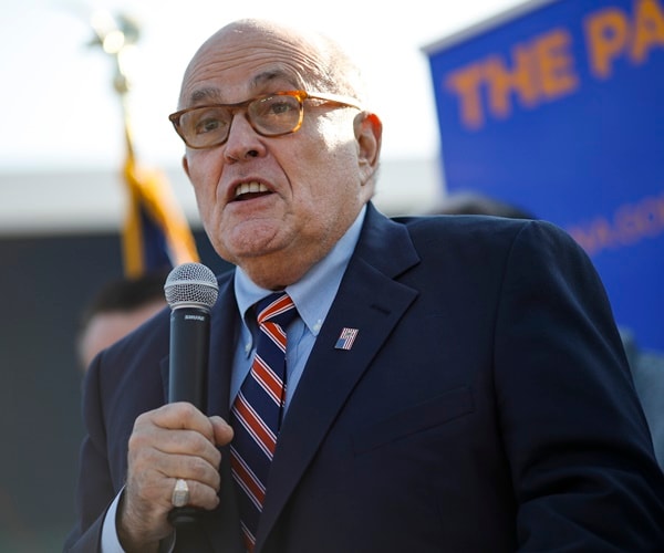 rudy giuliani speaks at a rally