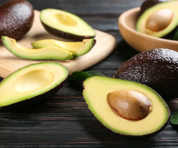 whole and cut avocados